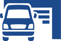 A photo of a car in front of a  partially closed storage unit